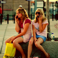 Free Train Station Girls Talking on Cell Phones Creative Commons